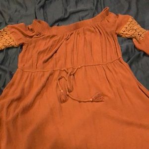 Lite pinkish brown top stretchy top could be worn off the shoulders